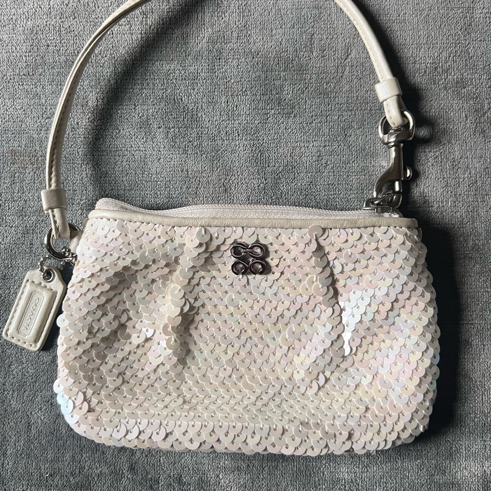 EUC Coach Sequin wristlet - Ivory -Rare
Perfect for a bride!